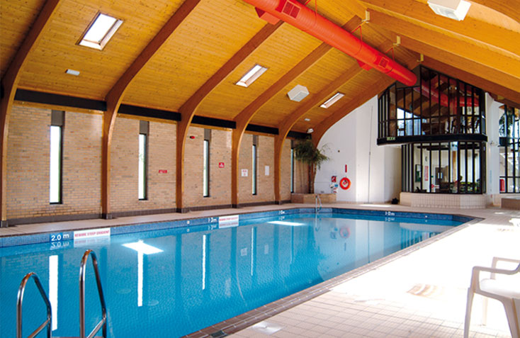 Use the indoor heated swimming pool during your holiday at Maenporth Estate, Cornwall.